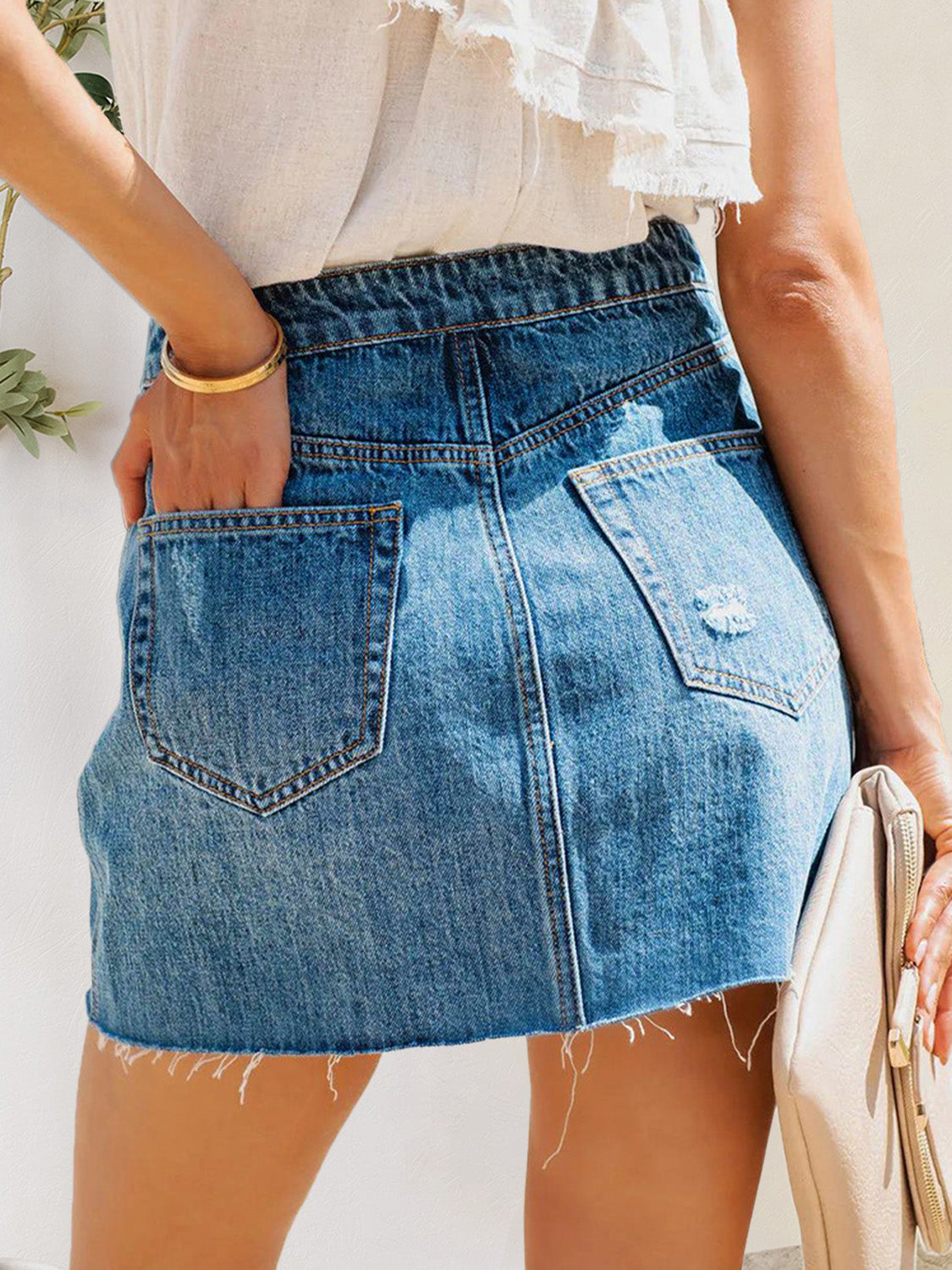 Women's Distressed Denim Skirt with Button Fly and Raw Hem - Trendy and Comfortable