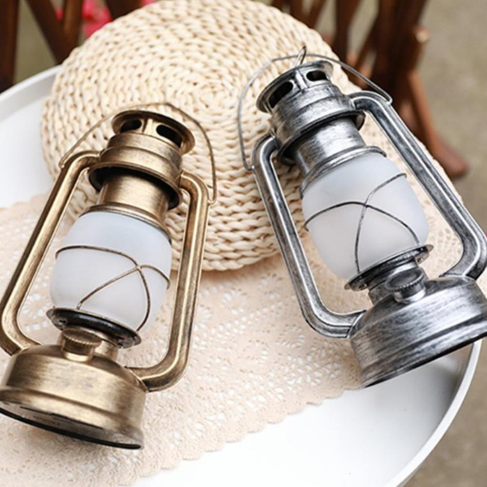 Vintage Waterproof LED Camping Lantern Durable Iron and PVC Construction Flame and Lighting Modes